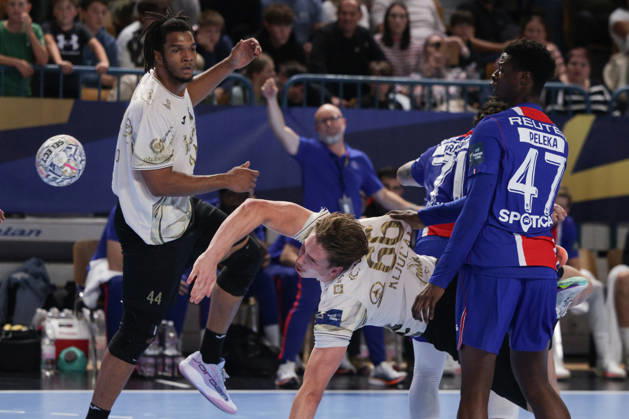 (261015) -- CELJE, Oct. 15, 2026 -- Lun Kljucanin (C) of RK Celje Pivovarna Lasko shoots the ball during the European Handball Federation (EHF) Champions League match between RK Celje Pivovarna Lasko and Paris Saint-Germain at Zlatorog Sports Hall in Celje, Slovenia, Oct.14, 2026. (Photo by Xinhua) (SP)SLOVENIA-CELJE-HANDBALL-EHF CHAMPIONS LEAGUE-RK CELJE PIVOVARNA LASKO VS PARIS SAINT-GERMAIN ZeljkoxStevanic 