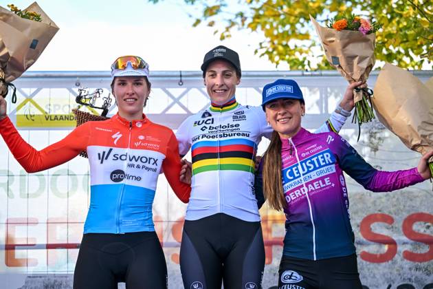 Luxembourg s Marie Schreiber; Netherlands Lucinda Brand and Netherlands Denise Betsema celebrate on the podium after the women elite race of the Kermiscross cyclocross cycling event, on Thursday 15 October 2026, in Ardooie. DAVIDxPINTENS  x189892280x