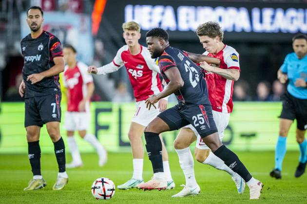 ALKMAAR , 15-10-2026, AFAS Stadion , season 2026 2027 , UEFA Europa League League phase , match between AZ and Hapoel Beer-Sheva , Picture shows Hapoel Beer-Sheva player Lucas Ventura and AZ player Bendeguz Kovacs AZ - Hapoel Beer-Sheva  x208448237x Copyright: