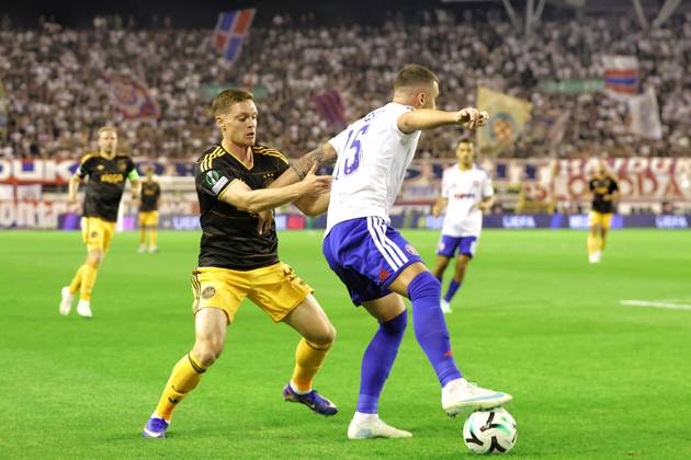 SPLIT, 15 10-2026, Poljud Stadium , season 2026 2027 , UEFA Conference League Football . Match between Hajduk Split and Ajax. Picture shows Ajax Viktor Tsygankov and Hajduk Split Dario Maresic Hajduk Split - Ajax  x208448529x Copyright: