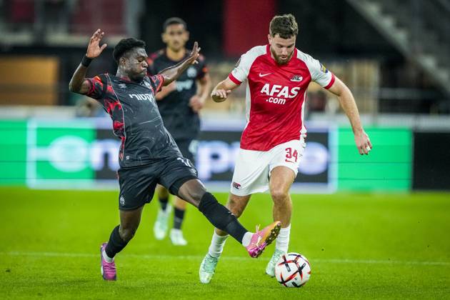 ALKMAAR , 15-10-2026, AFAS Stadion , season 2026 2027 , UEFA Europa League League phase , match between AZ and Hapoel Beer-Sheva , Picture shows Hapoel Beer-Sheva player Amankwah Forson and AZ player Mees de Wit AZ - Hapoel Beer-Sheva  x208448571x Copyright: