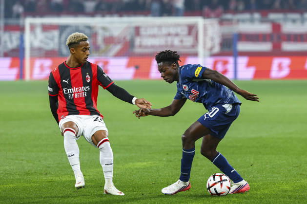 SOCCER - UEFA EL, RBS vs Milan SALZBURG,AUSTRIA,15.OCT.26 - SOCCER - UEFA Europa League, Red Bull Salzburg vs AC Milan. Image shows Omari Hutchinson (Milan) and Gaoussou Diakite (RBS).  GEPAxpictures xDavidxGeieregger