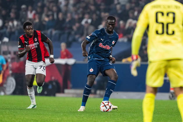SOCCER - UEFA EL, RBS vs Milan SALZBURG,AUSTRIA,15.OCT.26 - SOCCER - UEFA Europa League, Red Bull Salzburg vs AC Milan. Image shows Alphadjo Cisse (Milan) and Kevin Boma (RBS).  GEPAxpictures xJulioxArellano