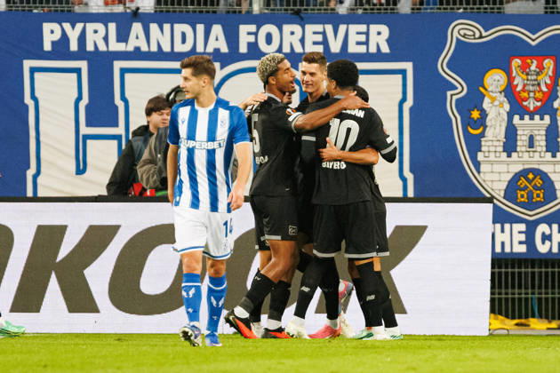 Patrik Schick and players of Bayer 04 Leverkusen seen celebrating after goal during UEFA Europe League 2026 2027 league phase game between teams of Lech Poznan and Bayer Leverkusen (Ernest Kolodziej Ball Raw Images) Poznan ENEA Stadion Poland Copyright: xErnestxKolodziejx ernestkolodziej_lech_bayer_2627KOL_7813