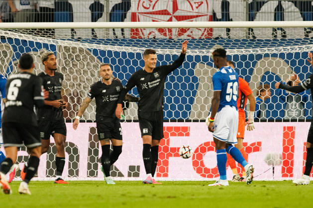 Patrik Schick and players of Bayer 04 Leverkusen seen celebrating after goal during UEFA Europe League 2026 2027 league phase game between teams of Lech Poznan and Bayer Leverkusen (Ernest Kolodziej Ball Raw Images) Poznan ENEA Stadion Poland Copyright: xErnestxKolodziejx ernestkolodziej_lech_bayer_2627KOL_7946