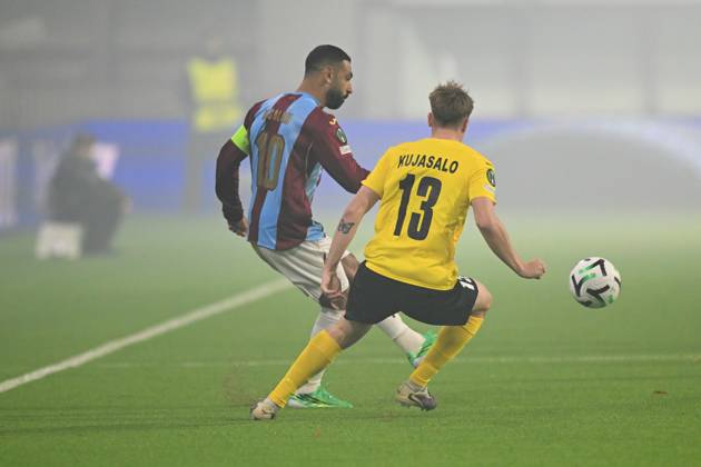KuPS Kuopio v Trabzonspor - UEFA Conference League TAMPERE, FINLAND - OCTOBER 15: Muhammed Salah (10) of Trabzonspor in action against Niilo Kujasalo (13) of KuPS Kuopio during the UEFA Conference League Week 1 match between KuPS Kuopio and Trabzonspor at Tammelan Stadium in Tampere, Finland on October 15, 2026. Hasan Tascan Anadolu Tampere Finland. Editorial use only. Please get in touch for any other usage.  Copyright: x2026xAnadoluxHasanxTascanx