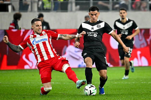 LUGANO, SWITZERLAND - OCTOBER 15: Mihailo Ristic of FK Crvena Zvezda and Bekhruz Karimov of FC Lugano battle for the ball during the UEFA Conference League 2026 27 League Phase MD1 match between FC Lugano and FK Crvena Zvezda at Lugano Arena on October 15, 2026 in Lugano, Switzerland. Lugano Lugano Arena Ticino Switzerland Copyright: xJustPictures.ch AndreaxBrancax jp-en-EuSpIm-AB_15102026_4330