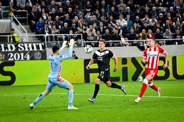LUGANO, SWITZERLAND - OCTOBER 15: Kevin Behrens of FC Lugano tries to score against goalkeeper Matheus Magalhaes of FK Crvena Zvezda during the UEFA Conference League 2026 27 League Phase MD1 match between FC Lugano and FK Crvena Zvezda at Lugano Arena on October 15, 2026 in Lugano, Switzerland. Lugano Lugano Arena Ticino Switzerland Copyright: xJustPictures.ch AndreaxBrancax jp-en-EuSpIm-AB_15102026_6875