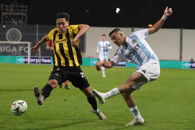 Erkin Tapalov of Kairat and Raki Aouani of Riga FC compete for the ball during a UEFA Conference League soccer match between Latvia™s Riga FC and Kazakhstan™s Kairat Almaty at Skonto Stadium in Riga, Latvia, Thursday, Oct. 15, 2026. Riga Latvia Copyright: xRomanxKoksarovx RKV02396.JPG