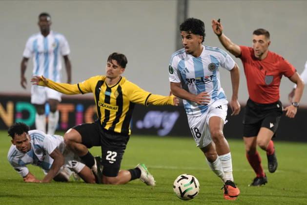 Salah Oulad M Hand of Riga FC and Gustavo Mendonca of Kairat compete for the ball during a UEFA Conference League soccer match between Latvia™s Riga FC and Kazakhstan™s Kairat Almaty at Skonto Stadium in Riga, Latvia, Thursday, Oct. 15, 2026. Riga Latvia Copyright: xRomanxKoksarovx RKV02430.JPG