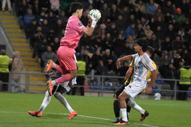 Temirlan Anarbekov of Kairat and Salah Oulad M Hand of Riga FCcompete for the ball during a UEFA Conference League soccer match between Latvia™s Riga FC and Kazakhstan™s Kairat Almaty at Skonto Stadium in Riga, Latvia, Thursday, Oct. 15, 2026. Riga Latvia Copyright: xRomanxKoksarovx RKV02524.JPG