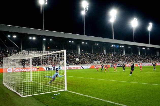 LUGANO, SWITZERLAND - OCTOBER 15: Anto Grgic of FC Lugano scores on a penalty shot against goalkeeper Matheus Magalhaes of FK Crvena Zvezda during the UEFA Conference League 2026 27 League Phase MD1 match between FC Lugano and FK Crvena Zvezda at Lugano Arena on October 15, 2026 in Lugano, Switzerland. Lugano Lugano Arena Ticino Switzerland Copyright: xJustPictures.ch AndreaxBrancax jp-en-EuSpIm-AB_15102026_1425