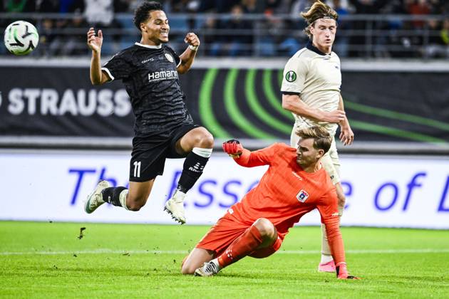 Gent s Momodou Lamin Sonko and Aarhus goalkeeper Mads Hedenstad Christiansen pictured in action during a soccer game between Belgian KAA Gent and Danish Aarhus GF, Thursday 15 October 2026 in Gent, the opening match of the UEFA Conference League league phase. TOMxGOYVAERT  x189914732x