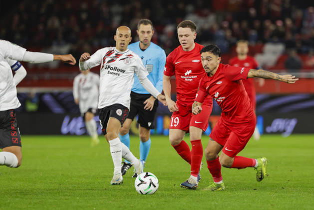 Soccer, Conference League 2026 Brann vs. Lincoln Red Imps, Bergen, October 15, 2026: Brann’s Niklas Castro and Eggert Aron Gudmundsson and Lincoln Red Imps’ Christian Rutjens during the Conference League soccer match between SK Brann and Lincoln Red Imps at Brann Stadium. Photo by Paul S. Amundsen NTB Bergen, Norway EDITORIAL USE ONLY RESTRICTED USE FOR BETTING COMPANIES  Copyright: xPaulxS.xAmundsenx xNTBx