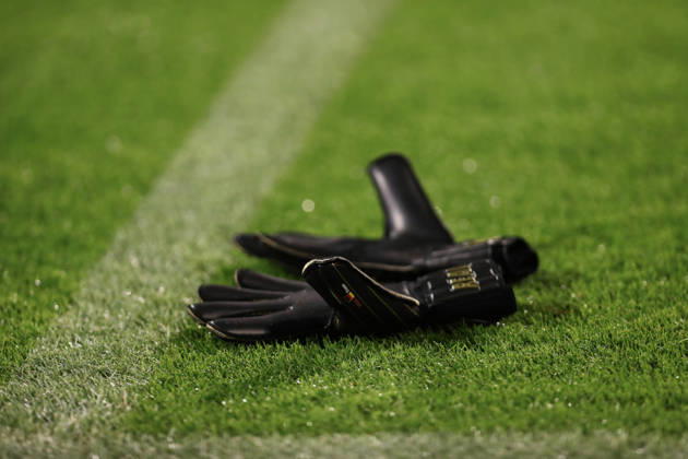 Zagreb, Croatia, 15th October 2026. UEFA Europa League. League phase, Matchday 2, Dinamo Zagreb vs Anderlecht at Maksimir Stadium, Zagreb. Goalkeeper gloves on the grass. UEFA Europa League, Dinamo Zagreb vs Anderlecht. 