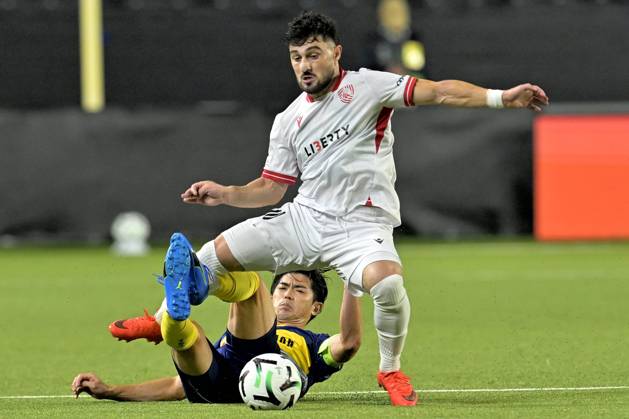 Sint-Truidense VV v Iberia Tbilisi - UEFA Conference League SINT-TRUIDEN, BELGIUM - OCTOBER 15 : Taniguchi Shogo defender of Sint-Truidense VV battles for the ball with Zviad Natchkhebia midfielder of FC Iberia 1999 Tbilisi during the UEFA Conference League 2026 27 first qualifying round between Sint-Truidense VV and Iberia Tbilisi on October 15, 2026 in Sint-Truiden, Belgium, 15 10 2026 Sint-Truiden Belgium Copyright: xSesx