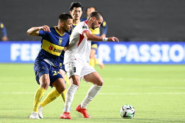 STVV s Visar Musliu; Iberia s Amiran Dzagania and STVV s Shogo Taniguchi pictured in action during a soccer game between Belgian Sint-Truidense VV and Georgian FC Iberia 1999 Tbilisi, Thursday 15 October 2026 in Sint-Truiden, the opening match of the UEFA Conference League league phase. JILLxDELSAUX  x189929183x