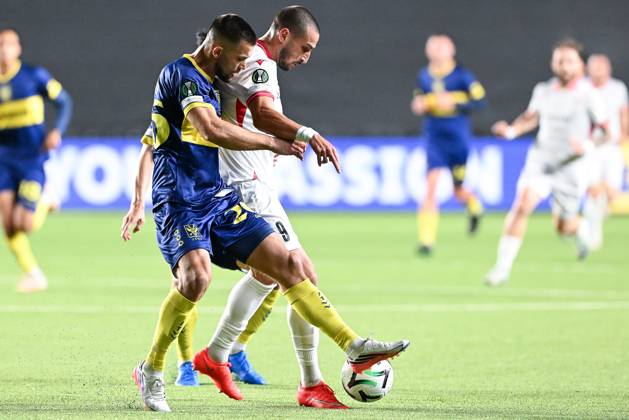 STVV s Visar Musliu; Iberia s Amiran Dzagania and STVV s Shogo Taniguchi pictured in action during a soccer game between Belgian Sint-Truidense VV and Georgian FC Iberia 1999 Tbilisi, Thursday 15 October 2026 in Sint-Truiden, the opening match of the UEFA Conference League league phase. JILLxDELSAUX  x189929185x
