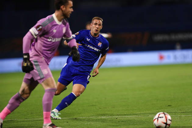 Zagreb, Croatia, 15th October 2026. UEFA Europa League. League phase, Matchday 2, Dinamo Zagreb vs Anderlecht at Maksimir Stadium, Zagreb. Luka STOJKOVIC (10) and Colin COOSEMANS (26). UEFA Europa League, Dinamo Zagreb vs Anderlecht. 