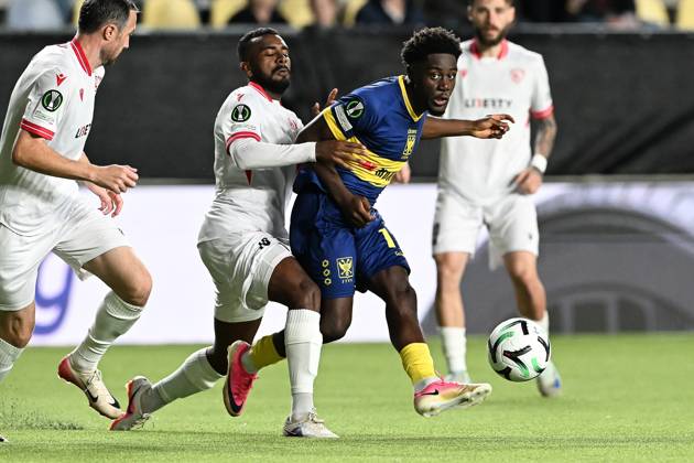 Iberia s Lucas Cafe and STVV s Nathanael Mbuku pictured in action during a soccer game between Belgian Sint-Truidense VV and Georgian FC Iberia 1999 Tbilisi, Thursday 15 October 2026 in Sint-Truiden, the opening match of the UEFA Conference League league phase. JILLxDELSAUX  x189932976x