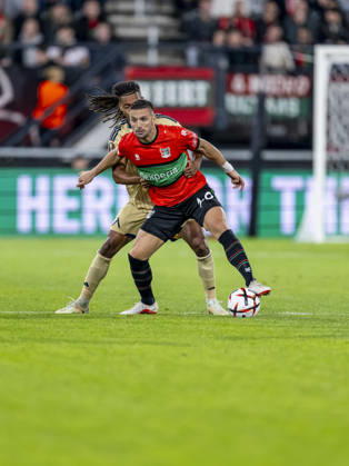 NIJMEGEN - Levski Sofia midfielder Mehdi Moubarik and NEC Nijmegen forward Duöan Tadic during the UEFA Europa League match between N.E.C. and Levski Sofia at Stadion De Goffert on 15 October 2026 in Nijmegen, Nederland. (Photo by DeFodi Images) -