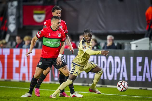 NIJMEGEN , 15-10-2026 , Stadium De Goffert , season 2026 2027 , UEFA Europa League football , match between NEC Nijmegen and Levski Sofia , picture shows NEC Nijmegen player Dusan Tadic and Levski Sofia player Everton Bala NEC - Levski Sofia  x208456721x Copyright: