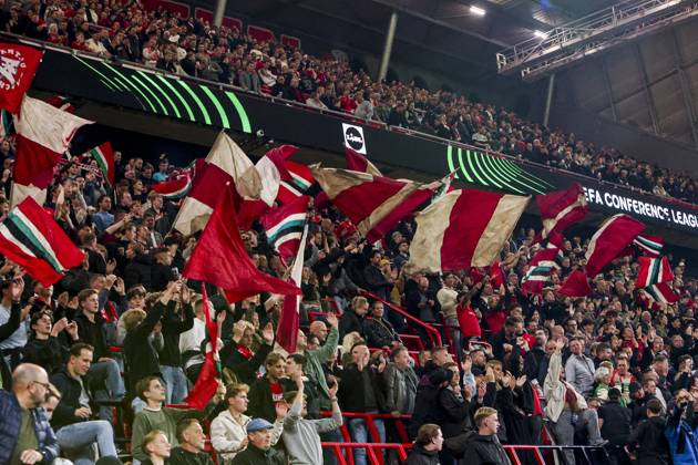 ENSCHEDE - FC Twente supporters wave flags during the UEFA Conference League match between FC Twente and FC Thun at De Grolsch Veste on October 15, 2026 in Enschede, the Netherlands. WART BRINKERHOF ANP UEFA Conference League 2026 27 xVIxANPxSportx xMarcelxterxBalsxIVx 572580893 originalFilename: 572580893.jpg