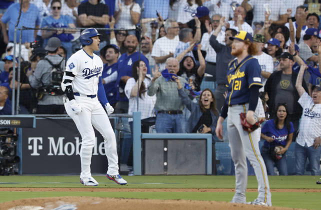 Los Angeles Dodgers designated hitter Shohei Ohtani (17) celebrates after hitting a three-run home run as Milwaukee Brewers pitcher Dustin May (21) watches the ball in the second inning during game four of the MLB, Baseball Herren, USA National League Championship Series at Dodger Stadium in Los Angeles, California, on Thursday, October 15, 2026.  LAP20261015717 CAROLINExBREHMAN