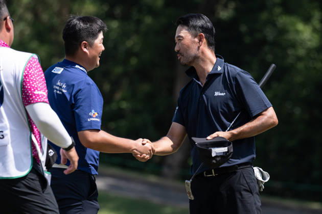 October 16, 2026, Coloane, Macao Sar, China: USAÃ¢â‚¬â ¢s Kevin NA (R) congratulates Sungjae IM (L) from Korea on his round of -7 par bringing him into the lead with -13par. Round 2 in the Macao Open Golf at Macau Golf & Country Club. Macau Open Golf Round 2  - ZUMAr144 20261016_zap_r144_085 Copyright: xJaynexRussellx