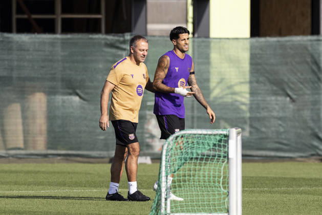 October 16, 2026, Sant Joan Despi, Barcelona, Spain: Hansi Flick, head coach and Joao Cancelo during the training day of FC Barcelona, Barca ahead the Spanish League, Laliga EA Sports, football match against Real Betis at Ciudad Esportiva Joan Gamper on October 16, 2026 in Sant Joan Despi, Barcelona, Spain. FC Barcelona Training And press conference, PK, Pressekonferenz - LaLiga EA Sports - ZUMAa181 20261016_zaa_a181_035 Copyright: xJavierxBorregox