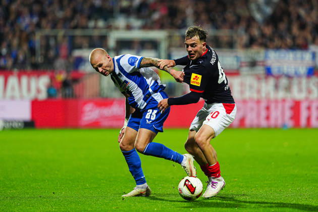 Jon Dagur Thorsteinsson (Hertha BSC, 23), Leon Parduzi (Holstein Kiel, 40) GER, Holstein Kiel vs. Hertha BSC, Fußball, 2. Bundesliga, Spieltag 08, Saison 2026 2027, 16.10.2026 DFL REGULATIONS PROHIBIT ANY USE OF PHOTOGRAPHS AS IMAGE SEQUENCES AND OR QUASI-VIDEO GER, Holstein Kiel vs. Hertha BSC, Fußball, 2. Bundesliga, Spieltag 08, Saison 2026 2027, 16.10.2026 Kiel Copyright: xEibner-Pressefoto MarcelxvonxFehrnx EP_MFN