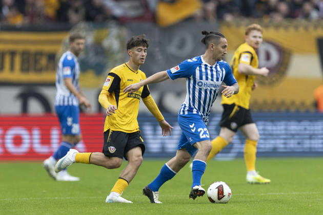 GER, Dresden, Fussball, 2. Bundesliga, 8. Spieltag, Dynamo Dresden vs. 1. FC Magdeburg im Bild v.l.: Patrice Covic (Dynamo Dresden 24), Baris Atik (FC Magdeburg 23), Zweikampf 18.10.2026, Rudolf-Harbig Stadion Dresden DFL DFB REGULATIONS PROHIBIT ANY USE OF PHOTOGRAPHS AS IMAGE SEQUENCES AND OR QUASI-VIDEO, Copyright: HMBxMedia PaulxFritz