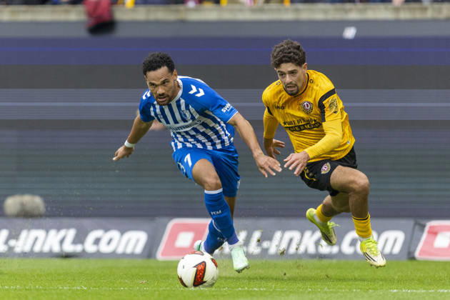GER, Dresden, Fussball, 2. Bundesliga, 8. Spieltag, Dynamo Dresden vs. 1. FC Magdeburg im Bild v.l.: Herbert Bockhorn (FC Magdeburg 07), Ben Bobzien (Dynamo Dresden 20), Zweikampf 18.10.2026, Rudolf-Harbig Stadion Dresden DFL DFB REGULATIONS PROHIBIT ANY USE OF PHOTOGRAPHS AS IMAGE SEQUENCES AND OR QUASI-VIDEO, Copyright: HMBxMedia PaulxFritz