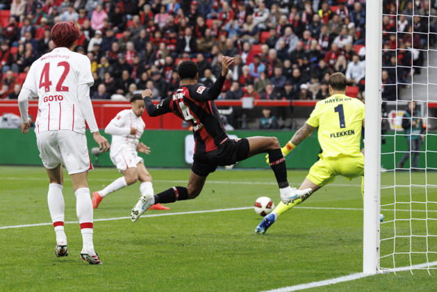 LEVERKUSEN, GERMANY - OCTOBER 18, 2026: Derry Scherhant (SC Freiburg, 7) scores 0-1, Jarell Quansah (Bayer 04 Leverkusen, 4) and Mark Flekken (Bayer 04 Leverkusen, 1) can’t defend during the German Bundesliga match on gameday 6 between Bayer 04 Leverkusen vs. SC Freiburg at BayArena on October 18, 2026 in Leverkusen, Germany. DFL REGULATIONS PROHIBIT ANY USE OF PHOTOGRAPHS AS IMAGE SEQUENCES AND OR QUASI-VIDEO. Northrhine-Westphalia Germany Copyright: xAxelxKohringx