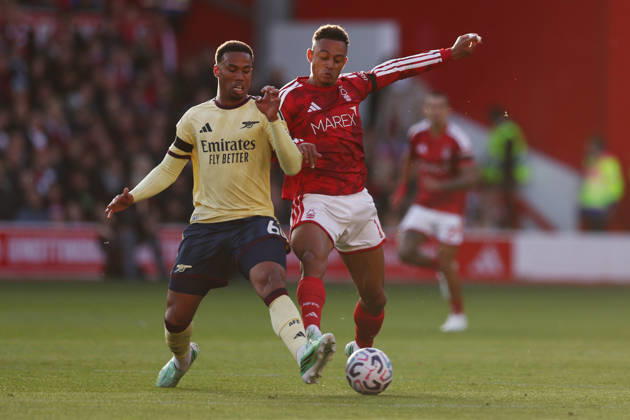Nottingham, England, 18th October 2026. Gabriel of Arsenal and Dan Ndoye of Nottingham Forest challenge for the ball during the Nottingham Forest vs Arsenal Premier League match at the City Ground, Nottingham. Picture credit should read: Jake Youle Sportimage EDITORIAL USE ONLY. No use with unauthorised audio, video, data, fixture lists, club league logos or live services. Online in-match use limited to 120 images, no video emulation. No use in betting, games or single club league player publications. SPI_023_JY_Forest_Arsenal SPI-5083-0023