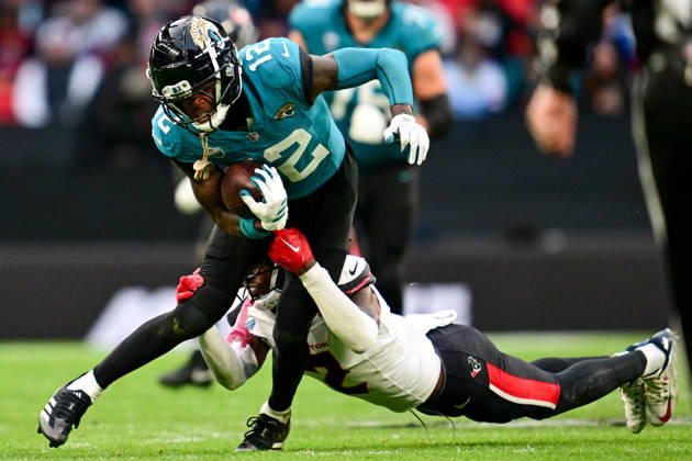 Jacksonville Jaguars v Houston Texans, International Series Travis Hunter (12) of Jacksonville Jaguars runs with the ball to the end zone during the International Series match between Jacksonville Jaguars and Houston Texans at Wembley Stadium, London, UK on 18 October 2026. Editorial use only , Copyright: xDennisxGoodwinx PSI-25022-0124