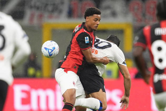 AC Milan s Koni De Winter fight for the ball with Atalanta s Nikola Krstovi? during the Serie A soccer match between AC Milan and Atalanta BC at the Giuseppe Meazza Stadium in Milan, Italy - October 18, 2026. - Soccer  Copyright: xFabioxFerrari LaPressex
