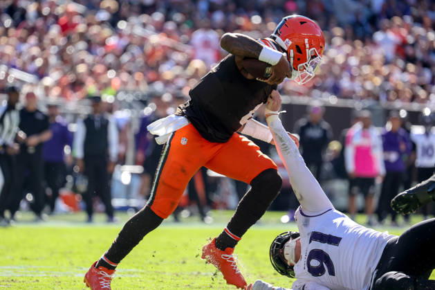 CLEVELAND, OH - OCTOBER 18: Baltimore Ravens linebacker Trey Hendrickson (91) grabs the jersey of Cleveland Browns quarterback Deshaun Watson (4) during the third quarter of the National Football League game between the Baltimore Ravens and Cleveland Browns on October 18, 2026, at Huntington Bank Field in Cleveland, OH. (Photo by Frank Jansky Icon Sportswire) NFL, American Football Herren, USA OCT 18 Ravens at Browns EDITORIAL USE ONLY Icon261018021