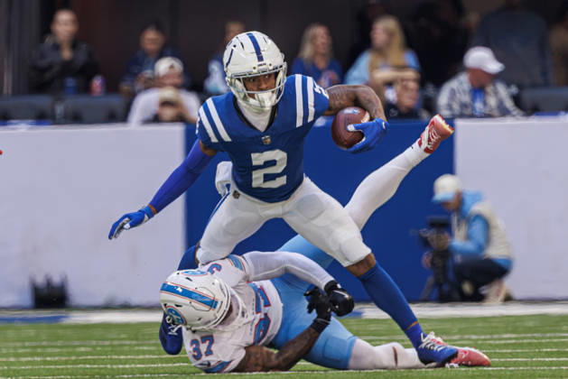 October 18, 2026, Indianapolis, Indiana, U.S: Indianapolis Colts wide receiver Josh Downs (2) runs after catching a pass and is hit by Tennessee Titans safety Amani Hooker (37) during the game between the Tennessee Titans and the Indianapolis Colts at Lucas Oil Stadium, Indianapolis, Indiana. Indianapolis U.S - ZUMAs304 20261018_zaf_s304_024 Copyright: xScottxStuartx