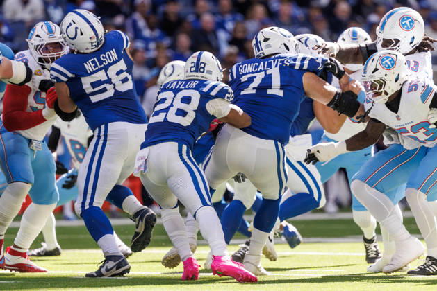 October 18, 2026, Indianapolis, Indiana, U.S: Indianapolis Colts running back Jonathan Taylor (28) looks for an opening in the line on a run during the game between the Tennessee Titans and the Indianapolis Colts at Lucas Oil Stadium, Indianapolis, Indiana. Indianapolis U.S - ZUMAs304 20261018_zaf_s304_004 Copyright: xScottxStuartx