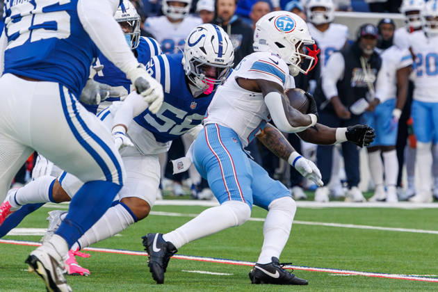 October 18, 2026, Indianapolis, Indiana, U.S: Tennessee Titans running back Tyjae Spears (2) carries the ball and is tackled by Indianapolis Colts linebacker Austin Ajiake (58) during the game between the Tennessee Titans and the Indianapolis Colts at Lucas Oil Stadium, Indianapolis, Indiana. Indianapolis U.S - ZUMAs304 20261018_zaf_s304_011 Copyright: xScottxStuartx