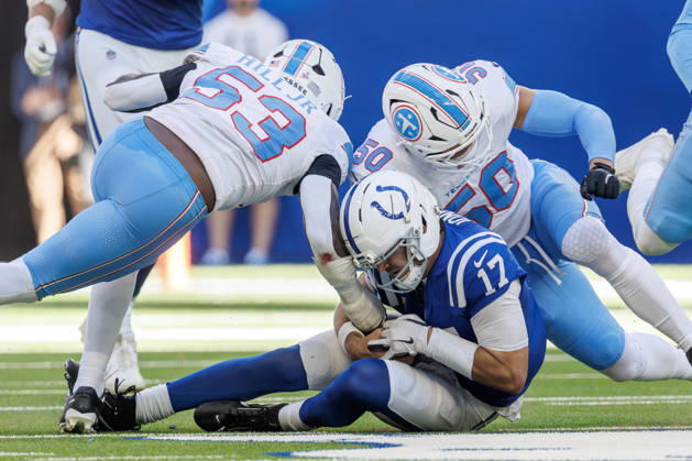 October 18, 2026, Indianapolis, Indiana, U.S: Indianapolis Colts quarterback Daniel Jones (17) slides under the oncoming hits from Tennessee Titans linebacker Anthony Hill Jr. (53) and Tennessee Titans linebacker Cody Barton (50) during the game between the Tennessee Titans and the Indianapolis Colts at Lucas Oil Stadium, Indianapolis, Indiana. Indianapolis U.S - ZUMAs304 20261018_zaf_s304_064 Copyright: xScottxStuartx