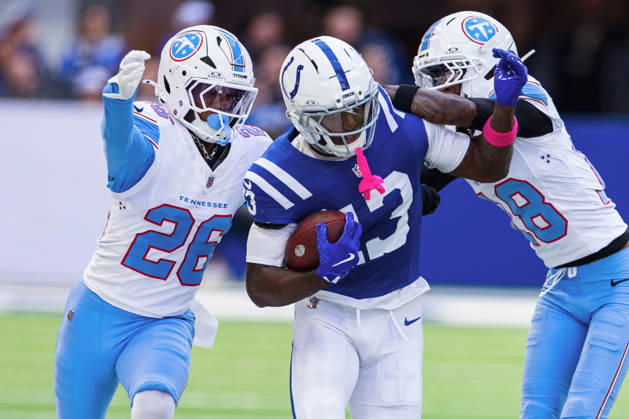 NFL, American Football Herren, USA 2026: Titans Vs Colts OCT 18 Oct 18, 2026; Indianapolis, IN, USA; Tennessee Titans defensive back Marcus Harris (26) and Tennessee Titans defensive back Cordale Flott (18) make the tackle on Indianapolis Colts wide receiver Laquon Treadwell (13) during NFL game action at Lucas Oil Stadium. Mandatory Credit: John Mersits-Cal Media (Credit Image: Â John Mersits Cal Sport Media) Indianapolis In USA EDITORIAL USE ONLY Copyright: xx ZUMA-20261018_zma_c04_288.jpg JohnxMersitsx csmphotothree535970