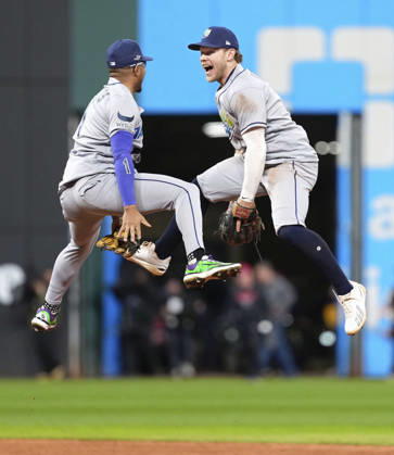 Baseball: Championship Series between Rays and Guardians Tampa Bay Rays shortstop Taylor Walls (R) and second baseman Richie Palacios celebrate a 3-1 victory over the Cleveland Guardians in Game 5 of the American League Championship Series in Cleveland, Ohio, on Oct. 18, 2026.  A14AA0005631166P