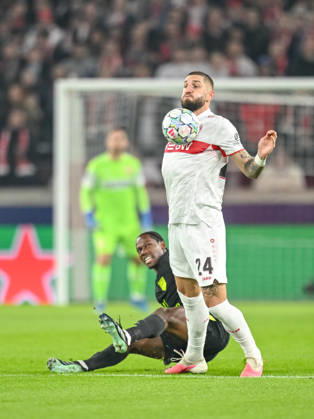 Jonathan David (Atletico Madrid) and Jeff Chabot (VfB Stuttgart) battle for the ball during the UEFA Champions League 2026 2027 match between Stuttgart and Atlético de Madrid at Arena Stuttgart on October 20, 2026 in Stuttgart, Germany. (Photo by Harry Langer DeFodi Images) -