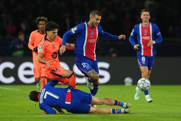 Khvicha Kvaratskhelia of PSG and Lucas Hernandez of PSG tackle Karim Adeyemi of Barcelona Paris Saint-Germain v Barcelona, UEFA Champions League, Football, Parc des Princes, Paris, France - 20 Oct 2026Paris Parc des Princes France  Copyright: xDavexWinter Shutterstockx 17226708as