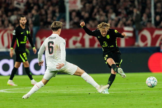 STUTTGART, GERMANY - OCTOBER 20: Morten Hjulmand (Atletico de Madrid, 23) controls the ball against Angelo Stiller (VfB Stuttgart, 6) during the UEFA Champions League match between VfB Stuttgart vs. Atletico de Madrid at Arena Stuttgart on matchday 3 of the UEFA Champions League on October 20, 2026 in Stuttgart, Germany. Baden-Wuerttemberg Germany Copyright: xSteffiexWunderlx