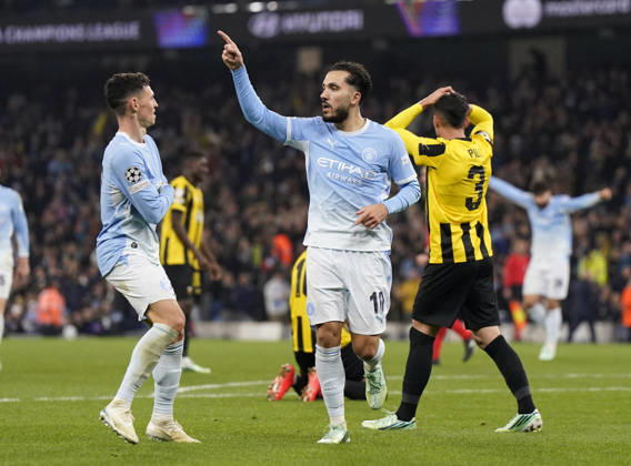 Manchester, England, 20th October 2026. Rayan Cherki of Manchester City (r) celebrates scoring their third goal (3-1) during the Manchester City vs AEK Athens UEFA Champions League match at the Etihad Stadium, Manchester. Picture credit should read: Andrew Yates Sportimage EDITORIAL USE ONLY. No use with unauthorised audio, video, data, fixture lists, club league logos or live services. Online in-match use limited to 120 images, no video emulation. No use in betting, games or single club league player publications. SPI_042_AY_ManCity__Athens SPI-5090-0042