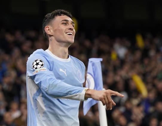 Manchester, England, 20th October 2026. Phil Foden of Manchester City celebrates scoring their fourth goal during the Manchester City vs AEK Athens UEFA Champions League match at the Etihad Stadium, Manchester. Picture credit should read: Andrew Yates Sportimage EDITORIAL USE ONLY. No use with unauthorised audio, video, data, fixture lists, club league logos or live services. Online in-match use limited to 120 images, no video emulation. No use in betting, games or single club league player publications. SPI_051_AY_ManCity__Athens SPI-5090-0051