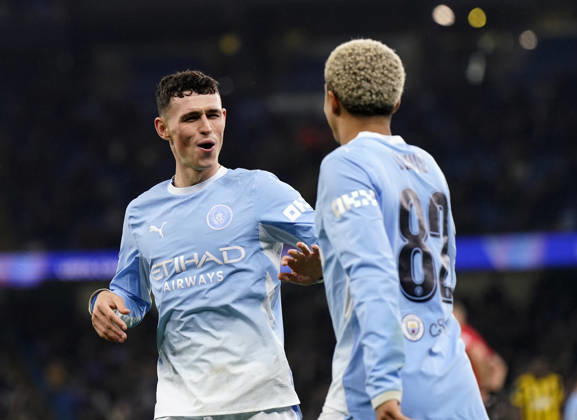 Manchester, England, 20th October 2026. Phil Foden of Manchester City celebrates scoring their fourth goal during the Manchester City vs AEK Athens UEFA Champions League match at the Etihad Stadium, Manchester. Picture credit should read: Andrew Yates Sportimage EDITORIAL USE ONLY. No use with unauthorised audio, video, data, fixture lists, club league logos or live services. Online in-match use limited to 120 images, no video emulation. No use in betting, games or single club league player publications. SPI_057_AY_ManCity__Athens SPI-5090-0057